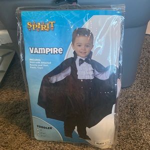 Kids 5T-6T vampire costume. Used once. Everything included.